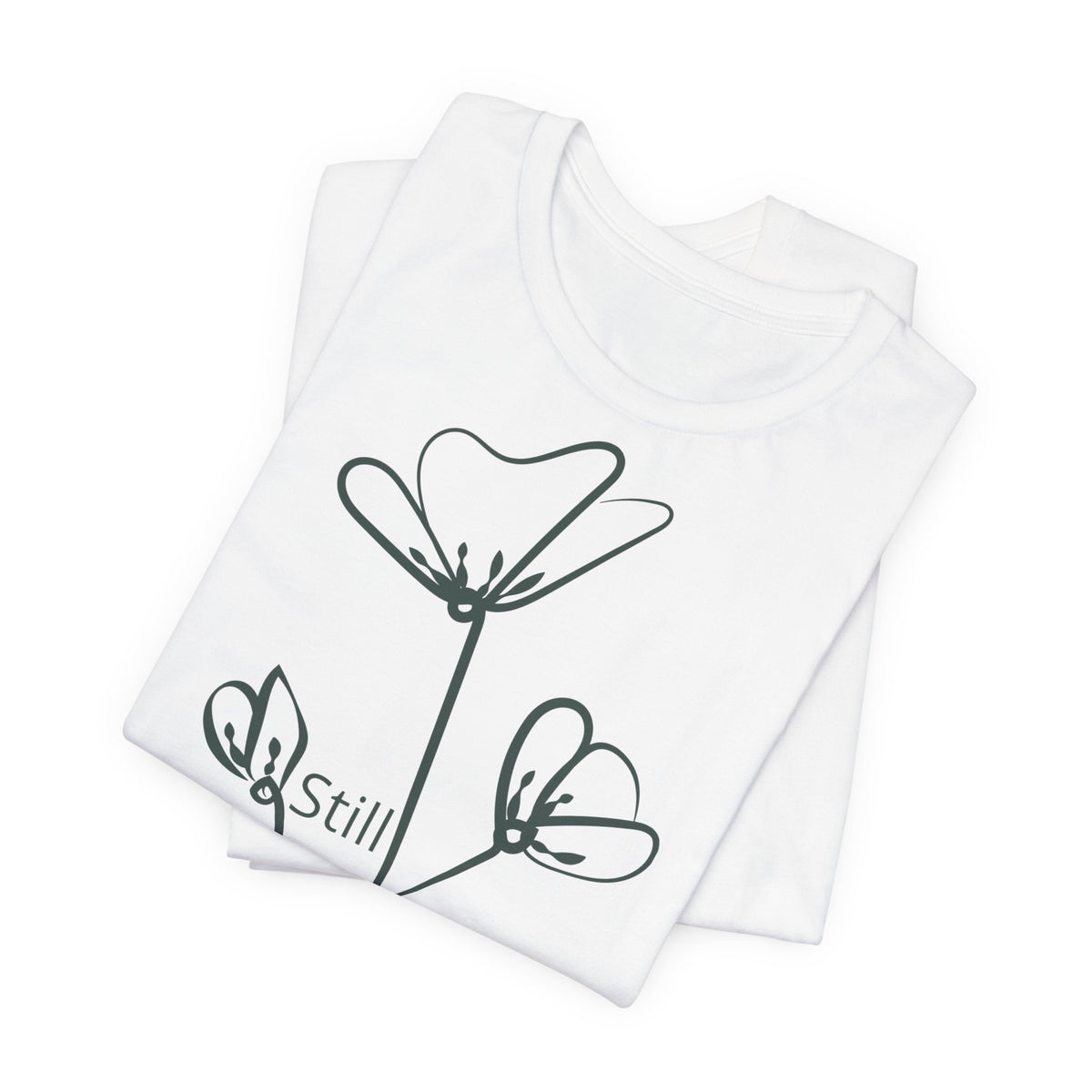 Still Growing Floral T-Shirt by Printify featuring a minimalist floral design and inspirational message on soft cotton fabric.