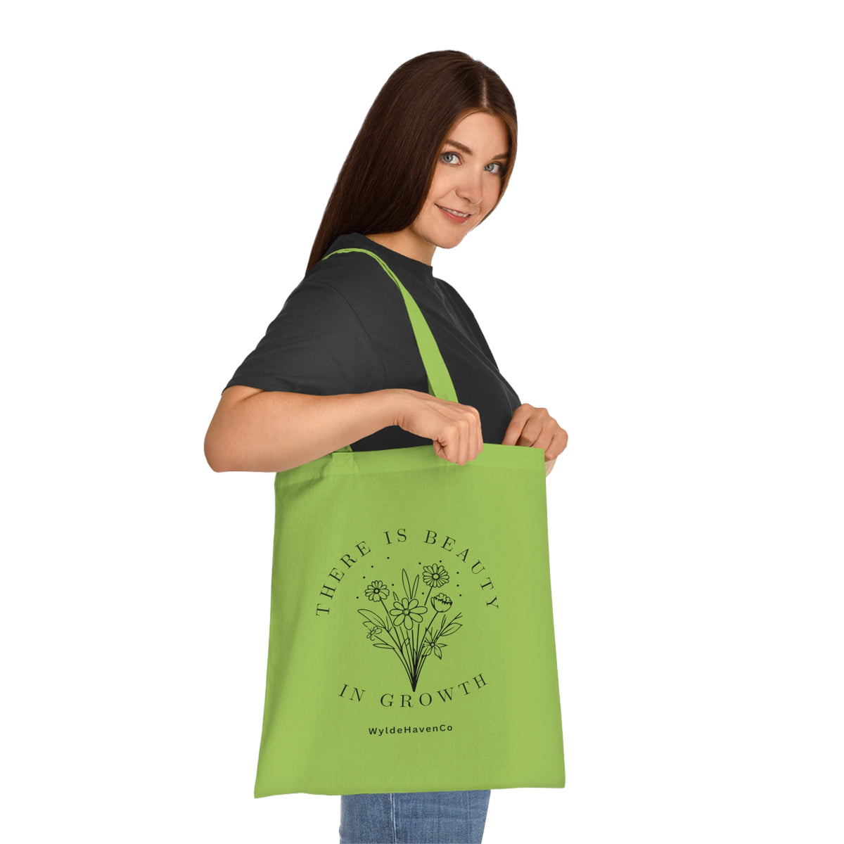 Floral cotton tote bag with "There Is Beauty In Growth" quote, stylish bag by Printify featuring vibrant flower design.