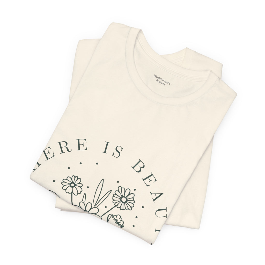 Printify floral T-shirt featuring "There Is Beauty In Growth" design on a soft, casual cotton tee.