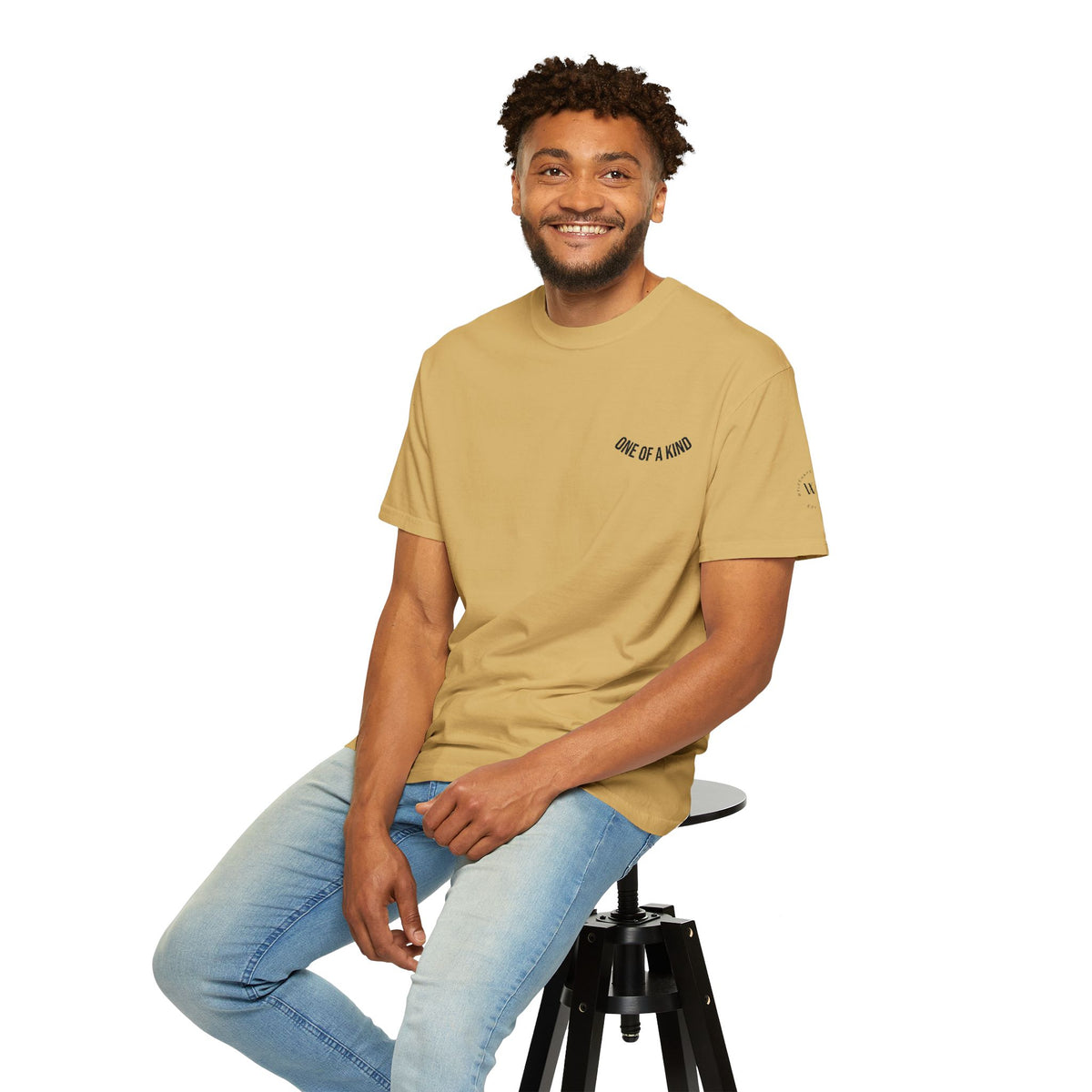 Black "One of a Kind" Chest Logo Printify T-Shirt with front graphic and casual fit, made from soft cotton fabric.