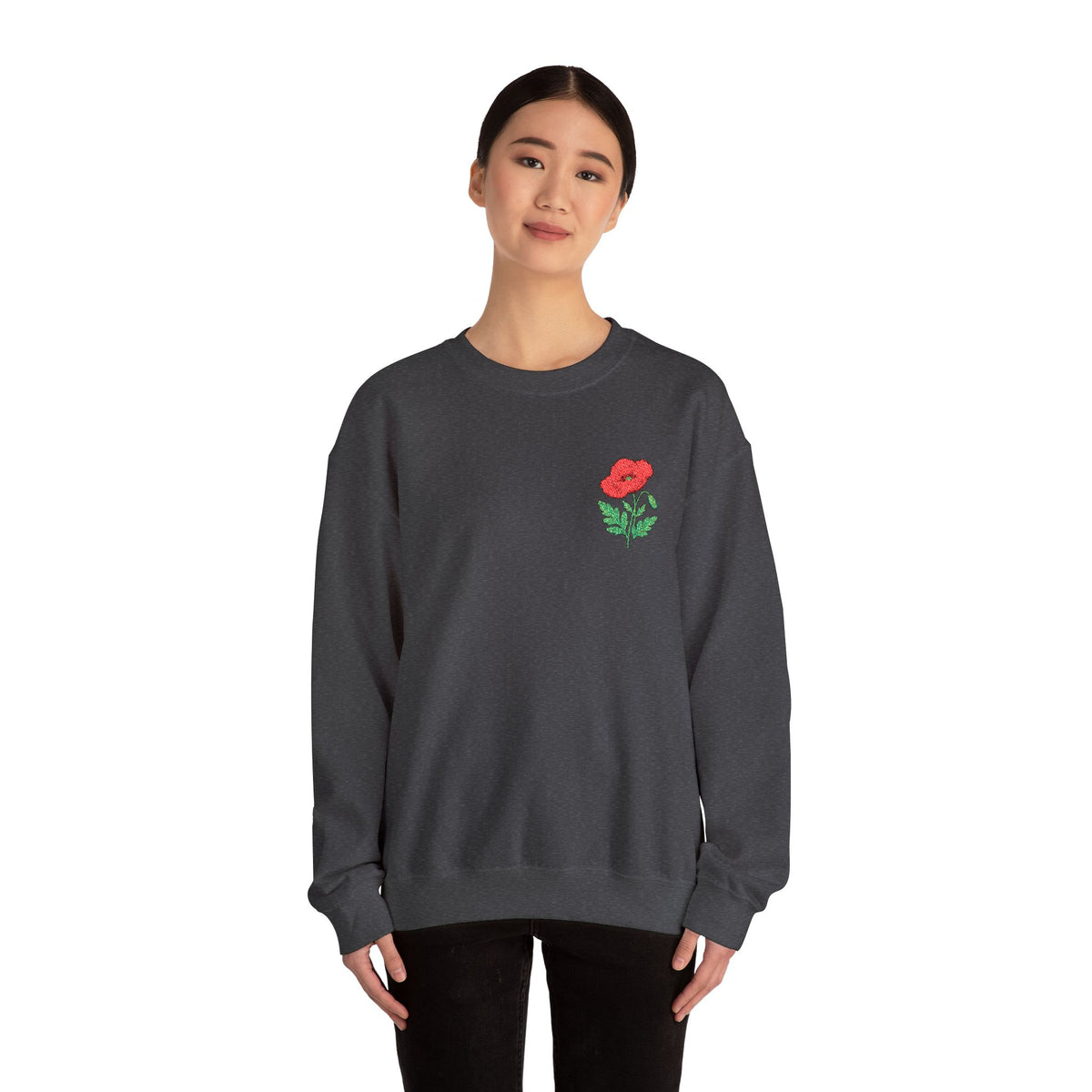 Unisex embroidered sweatshirt with a floral poppy design on the left chest, featuring comfortable fabric and stylish print.