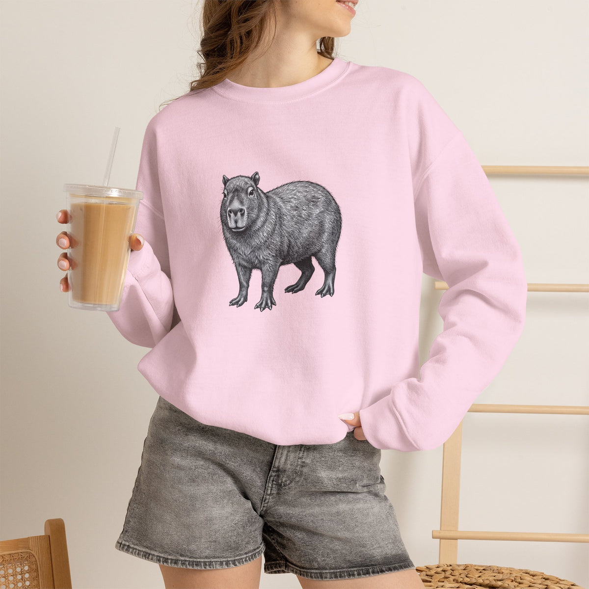 Capybara graphic sweatshirt from Wyldelife Collection featuring wildlife art, with a comfortable fit and detailed animal illustration.